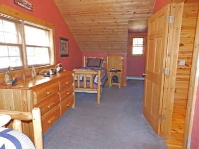 Welcome to this beautifully maintained Northern Michigan getaway on Michaywe Pines Course in Michigan - for sale on GolfHomes.com, golf home, golf lot