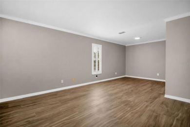 Located in the desirable Highland Lakes community, this on Highland Lakes Executive Golf Course in Florida - for sale on GolfHomes.com, golf home, golf lot