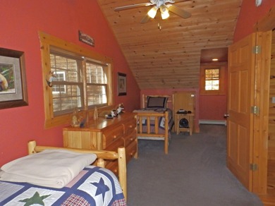 Welcome to this beautifully maintained Northern Michigan getaway on Michaywe Pines Course in Michigan - for sale on GolfHomes.com, golf home, golf lot