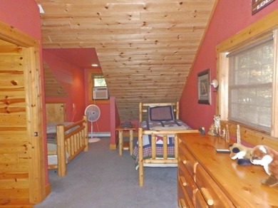 Welcome to this beautifully maintained Northern Michigan getaway on Michaywe Pines Course in Michigan - for sale on GolfHomes.com, golf home, golf lot