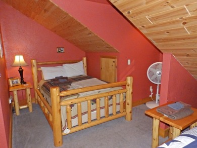 Welcome to this beautifully maintained Northern Michigan getaway on Michaywe Pines Course in Michigan - for sale on GolfHomes.com, golf home, golf lot