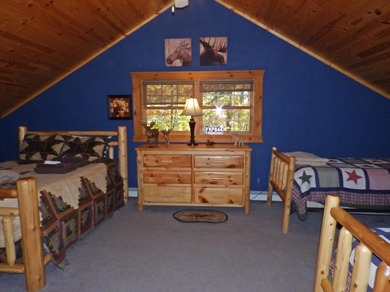 Welcome to this beautifully maintained Northern Michigan getaway on Michaywe Pines Course in Michigan - for sale on GolfHomes.com, golf home, golf lot