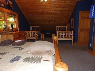 Welcome to this beautifully maintained Northern Michigan getaway on Michaywe Pines Course in Michigan - for sale on GolfHomes.com, golf home, golf lot