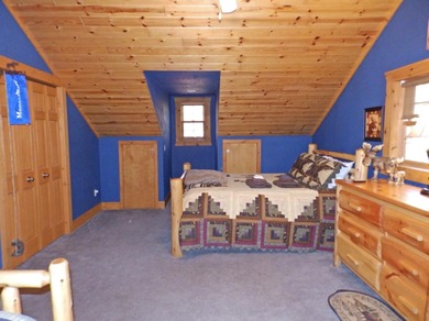 Welcome to this beautifully maintained Northern Michigan getaway on Michaywe Pines Course in Michigan - for sale on GolfHomes.com, golf home, golf lot