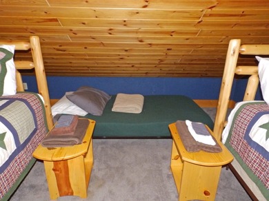 Welcome to this beautifully maintained Northern Michigan getaway on Michaywe Pines Course in Michigan - for sale on GolfHomes.com, golf home, golf lot