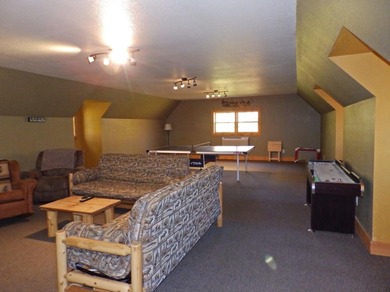 Welcome to this beautifully maintained Northern Michigan getaway on Michaywe Pines Course in Michigan - for sale on GolfHomes.com, golf home, golf lot