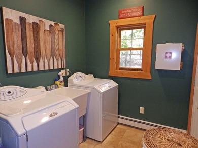 Welcome to this beautifully maintained Northern Michigan getaway on Michaywe Pines Course in Michigan - for sale on GolfHomes.com, golf home, golf lot