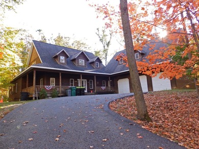 Welcome to this beautifully maintained Northern Michigan getaway on Michaywe Pines Course in Michigan - for sale on GolfHomes.com, golf home, golf lot