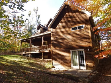 Welcome to this beautifully maintained Northern Michigan getaway on Michaywe Pines Course in Michigan - for sale on GolfHomes.com, golf home, golf lot