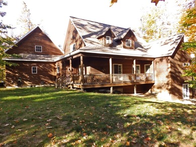 Welcome to this beautifully maintained Northern Michigan getaway on Michaywe Pines Course in Michigan - for sale on GolfHomes.com, golf home, golf lot