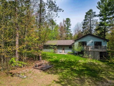 Awesome river setting with over 1,000' of Chocolay River on Northern Michigan University Golf Course (NMU) in Michigan - for sale on GolfHomes.com, golf home, golf lot