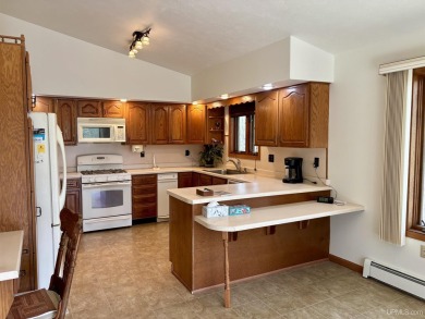 Awesome river setting with over 1,000' of Chocolay River on Northern Michigan University Golf Course (NMU) in Michigan - for sale on GolfHomes.com, golf home, golf lot