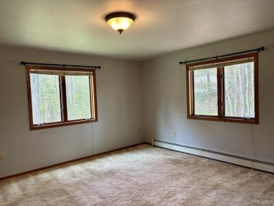 Awesome river setting with over 1,000' of Chocolay River on Northern Michigan University Golf Course (NMU) in Michigan - for sale on GolfHomes.com, golf home, golf lot