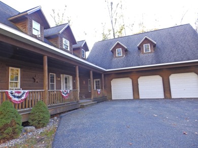 Welcome to this beautifully maintained Northern Michigan getaway on Michaywe Pines Course in Michigan - for sale on GolfHomes.com, golf home, golf lot