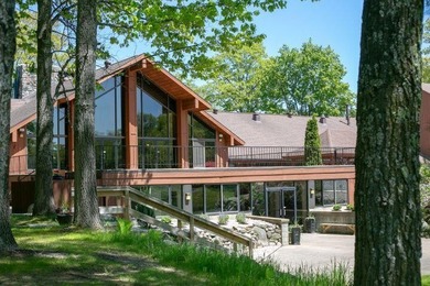 Welcome to this beautifully maintained Northern Michigan getaway on Michaywe Pines Course in Michigan - for sale on GolfHomes.com, golf home, golf lot