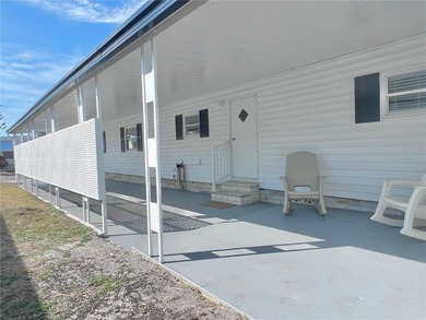 Welcome home to a truly exceptional renovation where modern on Fairway Village Golf Course in Florida - for sale on GolfHomes.com, golf home, golf lot