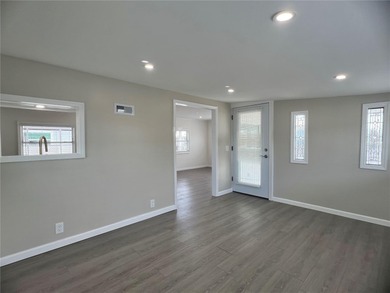 Welcome home to a truly exceptional renovation where modern on Fairway Village Golf Course in Florida - for sale on GolfHomes.com, golf home, golf lot