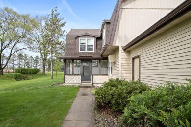 Embrace the opportunity to make this townhouse-style condo your on Saddle Ridge Golf Club in Wisconsin - for sale on GolfHomes.com, golf home, golf lot