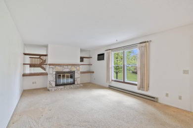 Embrace the opportunity to make this townhouse-style condo your on Saddle Ridge Golf Club in Wisconsin - for sale on GolfHomes.com, golf home, golf lot