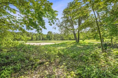 Build your dream retreat on this prime .63-acre parcel nestled on Wequetonsing Golf Course in Michigan - for sale on GolfHomes.com, golf home, golf lot