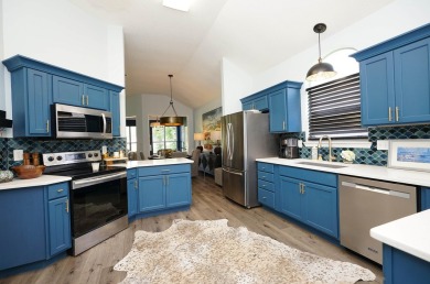 Located in the desirable Shalimar Point Golf and Tennis on Shalimar Pointe Golf and Country Club in Florida - for sale on GolfHomes.com, golf home, golf lot