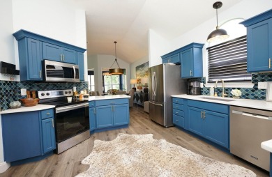 Located in the desirable Shalimar Point Golf and Tennis on Shalimar Pointe Golf and Country Club in Florida - for sale on GolfHomes.com, golf home, golf lot