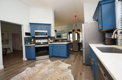 Located in the desirable Shalimar Point Golf and Tennis on Shalimar Pointe Golf and Country Club in Florida - for sale on GolfHomes.com, golf home, golf lot
