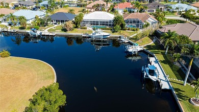 EXPERIENCE PANORAMIC WIDE BASIN & ENDLESS INTERSECTING CANAL on Saint Andrews South Golf Club in Florida - for sale on GolfHomes.com, golf home, golf lot