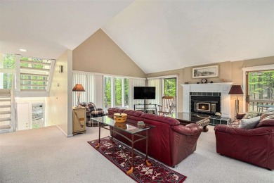 Nestled on a serene, wooded lot and backing up to protected on Birchwood Farms Golf and Country Club in Michigan - for sale on GolfHomes.com, golf home, golf lot