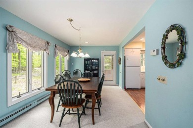 Nestled on a serene, wooded lot and backing up to protected on Birchwood Farms Golf and Country Club in Michigan - for sale on GolfHomes.com, golf home, golf lot