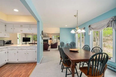 Nestled on a serene, wooded lot and backing up to protected on Birchwood Farms Golf and Country Club in Michigan - for sale on GolfHomes.com, golf home, golf lot