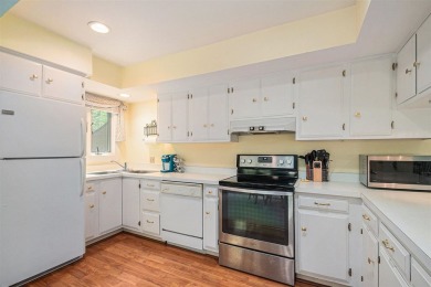 Nestled on a serene, wooded lot and backing up to protected on Birchwood Farms Golf and Country Club in Michigan - for sale on GolfHomes.com, golf home, golf lot