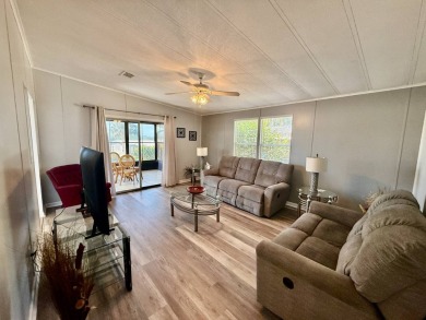 Home is located in Water Oak Country Club Estates in Lady Lake on Water Oak Country Club Estates in Florida - for sale on GolfHomes.com, golf home, golf lot