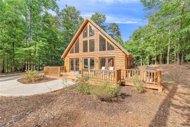 Discover a newer home opposite Hartwell Lake, boasting seasonal on The Trail At Chickasaw Pointe in South Carolina - for sale on GolfHomes.com, golf home, golf lot