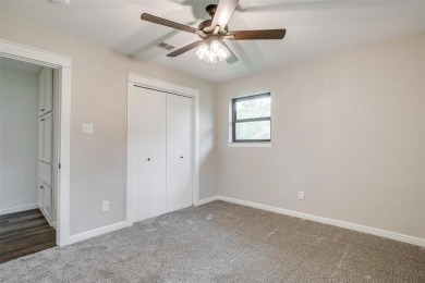 Set atop a hill, hidden from the road and surrounded by large on Squaw Creek Golf Club in Texas - for sale on GolfHomes.com, golf home, golf lot