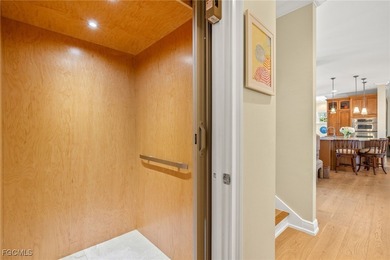 Stunning Waterfront Elevated 3-Story Home with Breathtaking on The Sanctuary Golf Club in Florida - for sale on GolfHomes.com, golf home, golf lot