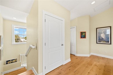 Stunning Waterfront Elevated 3-Story Home with Breathtaking on The Sanctuary Golf Club in Florida - for sale on GolfHomes.com, golf home, golf lot