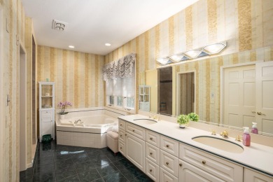 Near the school and tucked in a cul-de-sac, the original builder on Goodrich Country Club in Michigan - for sale on GolfHomes.com, golf home, golf lot