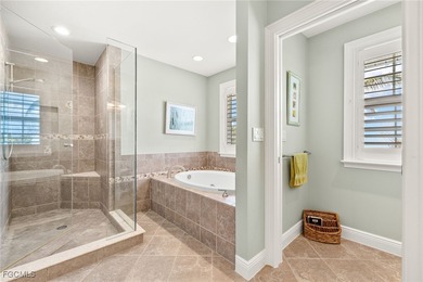 Stunning Waterfront Elevated 3-Story Home with Breathtaking on The Sanctuary Golf Club in Florida - for sale on GolfHomes.com, golf home, golf lot