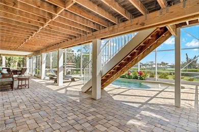 Stunning Waterfront Elevated 3-Story Home with Breathtaking on The Sanctuary Golf Club in Florida - for sale on GolfHomes.com, golf home, golf lot
