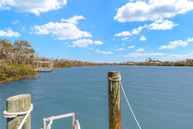 Stunning Waterfront Elevated 3-Story Home with Breathtaking on The Sanctuary Golf Club in Florida - for sale on GolfHomes.com, golf home, golf lot