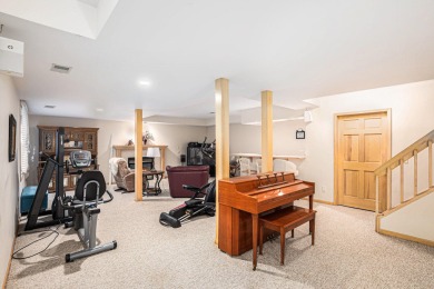Near the school and tucked in a cul-de-sac, the original builder on Goodrich Country Club in Michigan - for sale on GolfHomes.com, golf home, golf lot