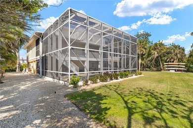 Stunning Waterfront Elevated 3-Story Home with Breathtaking on The Sanctuary Golf Club in Florida - for sale on GolfHomes.com, golf home, golf lot