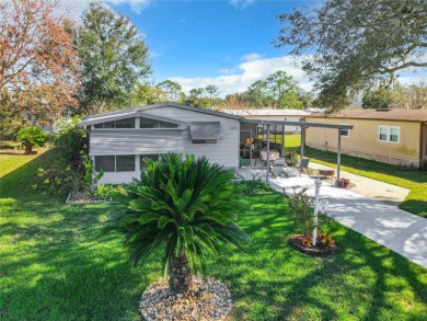 Welcome to this charming 2 bedroom 2 bathroom home in The on Silver Lake Executive Golf Course in Florida - for sale on GolfHomes.com, golf home, golf lot