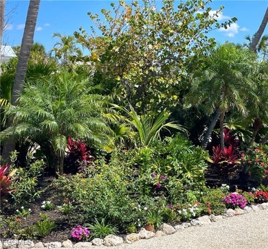 Stunning Waterfront Elevated 3-Story Home with Breathtaking on The Sanctuary Golf Club in Florida - for sale on GolfHomes.com, golf home, golf lot