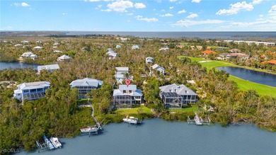 Stunning Waterfront Elevated 3-Story Home with Breathtaking on The Sanctuary Golf Club in Florida - for sale on GolfHomes.com, golf home, golf lot