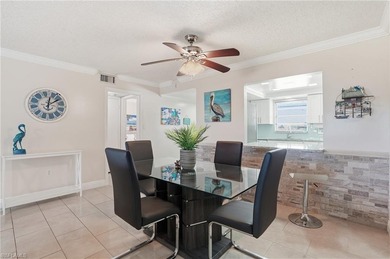 UPDATED & FURNISHED WITH COASTAL CHARM furniture & furnishings on Hibiscus Golf Club in Florida - for sale on GolfHomes.com, golf home, golf lot