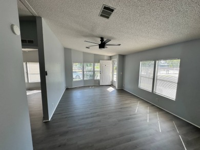Beautifully renovated 2 bedroom, 2 bathroom home.  The home is on Del Tura Golf and Country Club in Florida - for sale on GolfHomes.com, golf home, golf lot