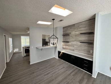 Beautifully renovated 2 bedroom, 2 bathroom home.  The home is on Del Tura Golf and Country Club in Florida - for sale on GolfHomes.com, golf home, golf lot