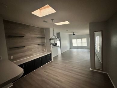 Beautifully renovated 2 bedroom, 2 bathroom home.  The home is on Del Tura Golf and Country Club in Florida - for sale on GolfHomes.com, golf home, golf lot